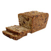 Nut, seed, grain & fruit loaf. Full loaf with two slices laying flat in front of loaf, showing the inside of the bread with lots of nuts, seeds, grains and fruit visible. Displayed on white background.